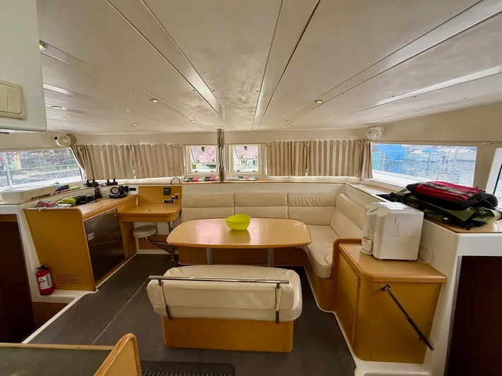 Road Less Travelled Yacht Photos Pics Interior of 2013 Lagoon 421 catamaran with spacious seating and dining area.