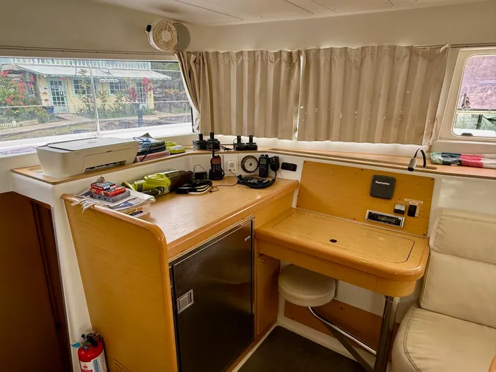 Road Less Travelled Yacht Photos Pics Interior of 2013 Lagoon 421 yacht with navigation station and equipment.