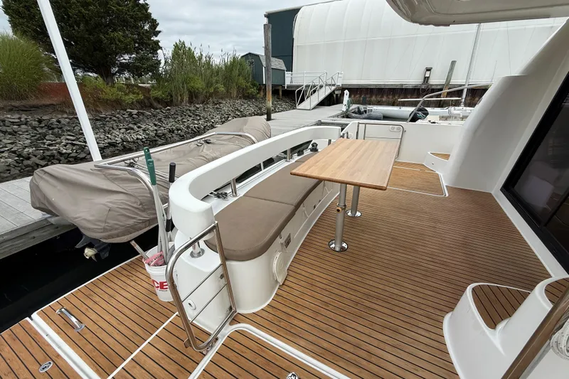 Ohana Yacht Photos Pics 2015 Fountaine Pajot Summerland 40 LC yacht deck with seating and table.