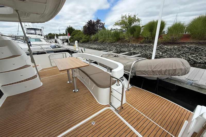 Ohana Yacht Photos Pics 2015 Fountaine Pajot Summerland 40 LC yacht deck with seating and table.
