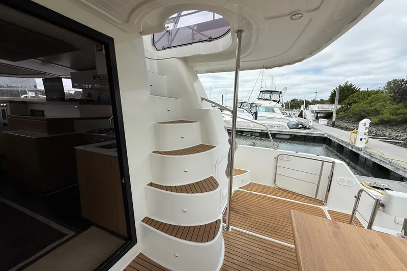 Ohana Yacht Photos Pics 2015 Fountaine Pajot Summerland 40 LC yacht with elegant interior and marina view.