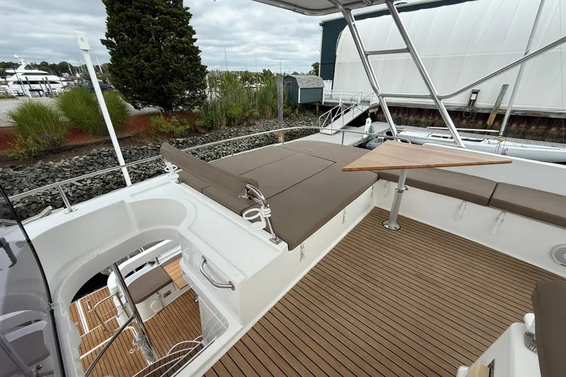Ohana Yacht Photos Pics 2015 Fountaine Pajot Summerland 40 LC yacht deck with seating and table.