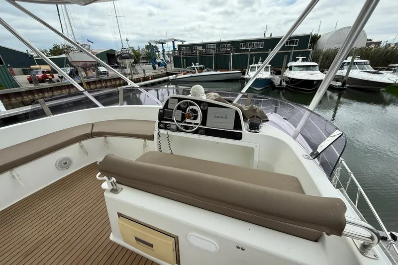 Ohana Yacht Photos Pics Flybridge of 2015 Fountaine Pajot Summerland 40 LC with helm and seating area.