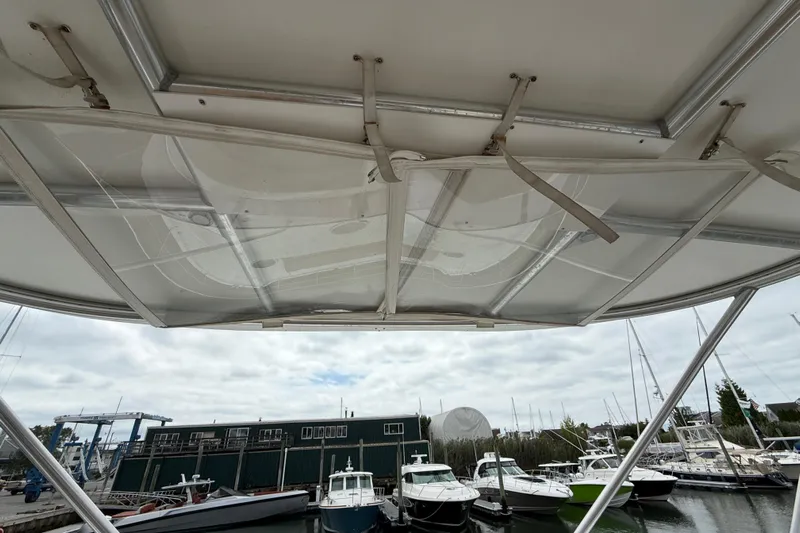 Ohana Yacht Photos Pics 2015 Fountaine Pajot Summerland 40 LC catamaran docked at marina, view from under canopy.