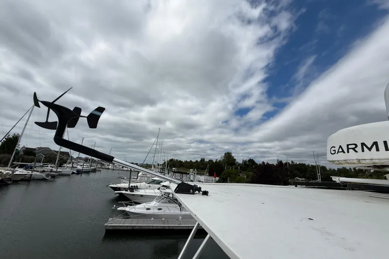 Ohana Yacht Photos Pics 2015 Fountaine Pajot Summerland 40 LC at marina with cloudy sky and Garmin equipment.