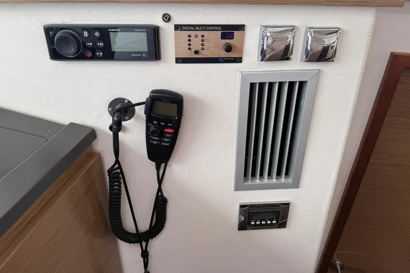 Ohana Yacht Photos Pics Control panel of 2015 Fountaine Pajot Summerland 40 LC with radio and digital controls.