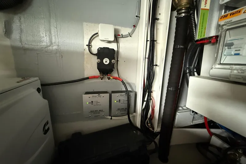 Ohana Yacht Photos Pics Electrical system inside 2015 Fountaine Pajot Summerland 40 LC boat, featuring wiring and components.