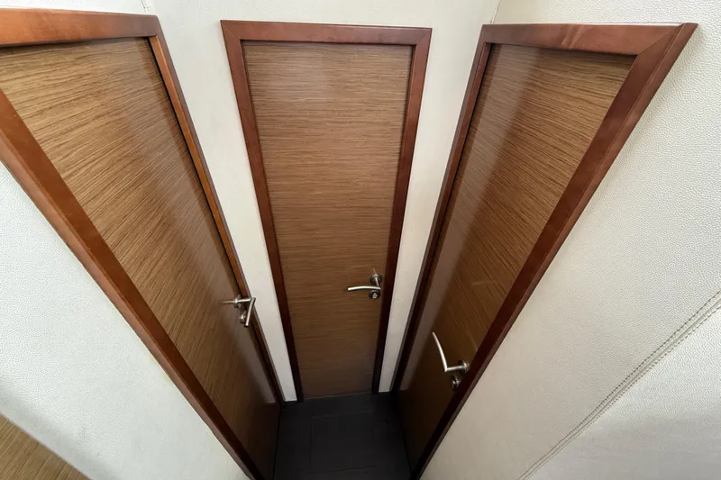 Ohana Yacht Photos Pics Wooden doors inside a 2015 Fountaine Pajot Summerland 40 LC yacht.