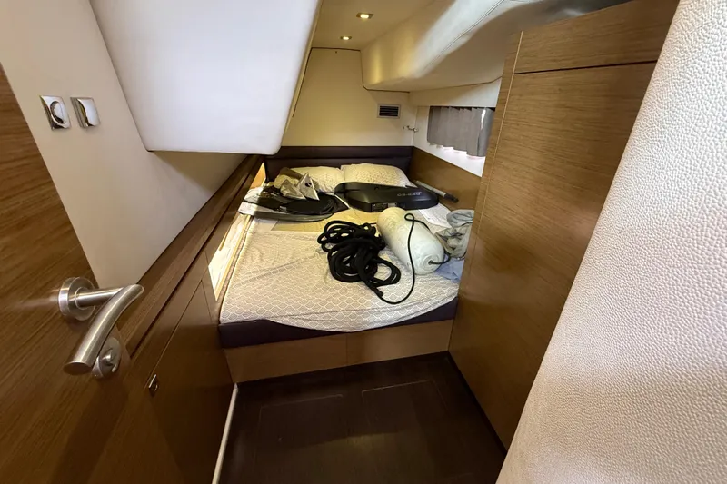 Ohana Yacht Photos Pics Interior cabin of 2015 Fountaine Pajot Summerland 40 LC with bed and storage.