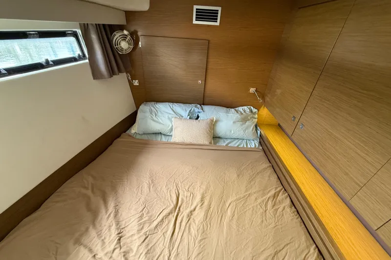 Ohana Yacht Photos Pics Cozy bedroom interior of 2015 Fountaine Pajot Summerland 40 LC yacht.