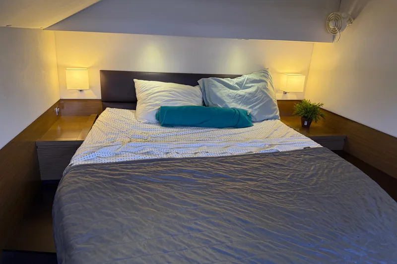 Ohana Yacht Photos Pics Cozy bedroom interior on 2015 Fountaine Pajot Summerland 40 LC yacht with modern lighting.