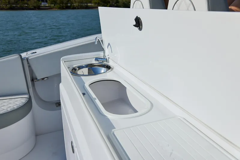  Yacht Photos Pics Luxury sink area on 2021 Midnight Express 43' Open boat, featuring sleek design.