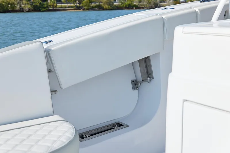  Yacht Photos Pics Interior view of 2021 Midnight Express 43' Open boat, featuring white seating and sleek design.