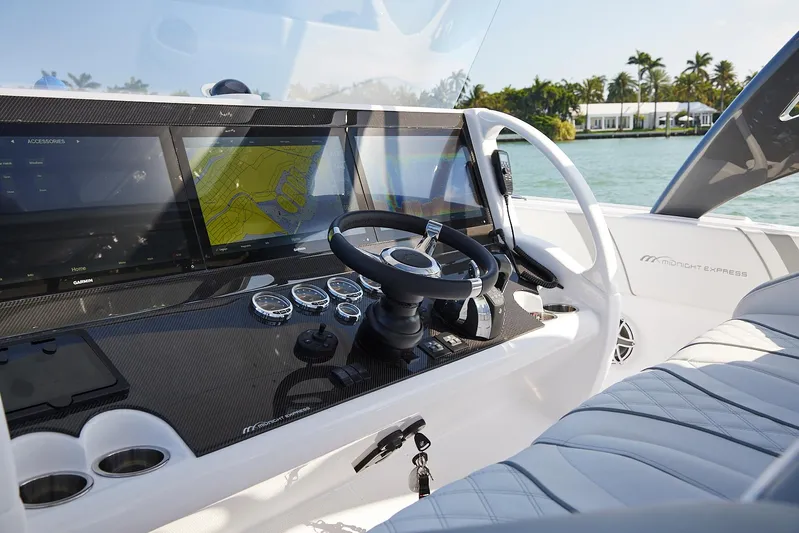  Yacht Photos Pics Cockpit of 2021 Midnight Express 43' Open boat with navigation screens and steering wheel.