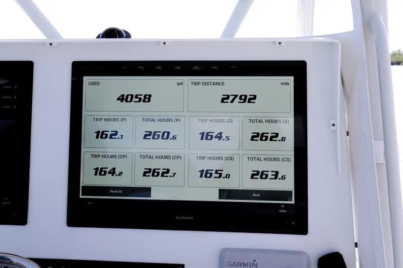  Yacht Photos Pics Dashboard display of 2023 Contender 44 ST showing fuel usage and trip data.