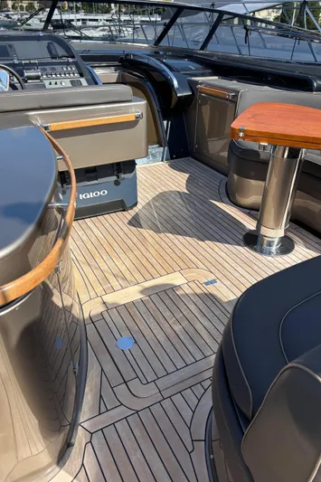 (2021 And 2024 Retrofit) Yacht Photos Pics Luxurious 2003 Riva 52' le yacht interior with elegant wood and leather finishes.