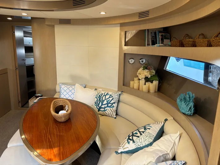 (2021 And 2024 Retrofit) Yacht Photos Pics Luxurious interior of a 2003 Riva 52' LE yacht with elegant seating and decor.