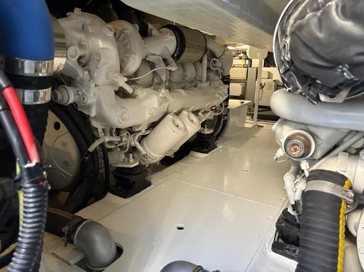 (2021 And 2024 Retrofit) Yacht Photos Pics Engine room of a 2003 Riva 52' LE yacht, showcasing mechanical components.