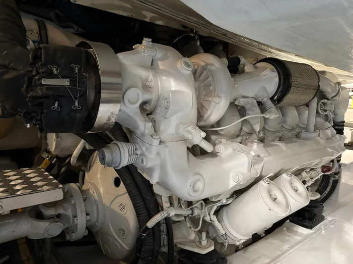 (2021 And 2024 Retrofit) Yacht Photos Pics Engine of a 2003 Riva 52' le yacht, showcasing intricate mechanical components.