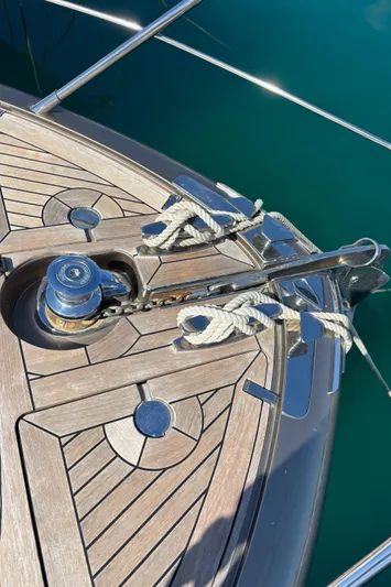 (2021 And 2024 Retrofit) Yacht Photos Pics Deck of 2003 Riva 52' le yacht with ropes and winch.