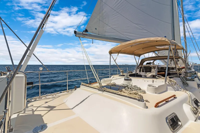 Mrs Jones Yacht Photos Pics Sailing on a 2009 Hylas 54 yacht under clear blue skies.