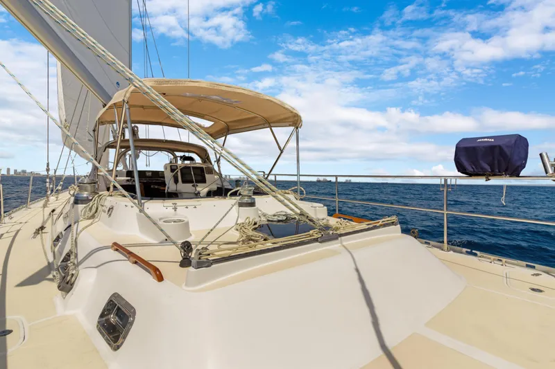 Mrs Jones Yacht Photos Pics Sailing on a 2009 Hylas 54 yacht under clear blue skies.