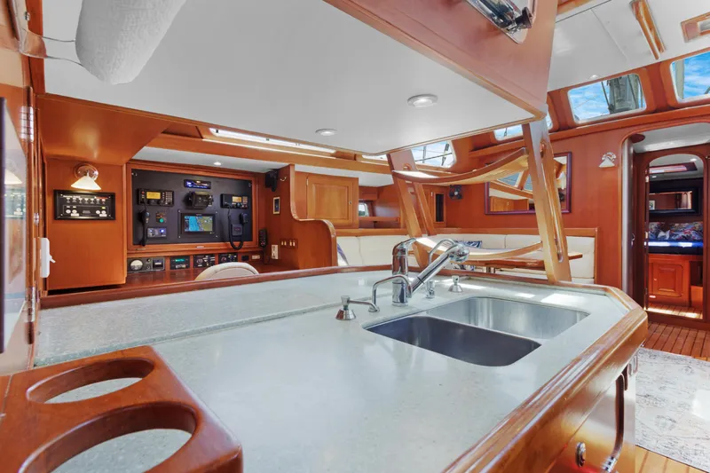 Mrs Jones Yacht Photos Pics Luxurious 2009 Hylas 54 yacht interior with modern kitchen and navigation area.