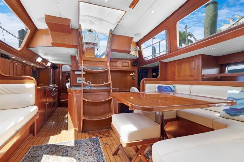 Mrs Jones Yacht Photos Pics Luxurious interior of a 2009 Hylas 54 yacht with elegant wood finishes.