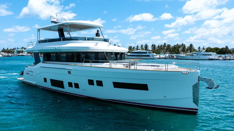 Sand Bar Yacht Photos Pics 2018 Sirena 64 yacht cruising in clear blue waters.