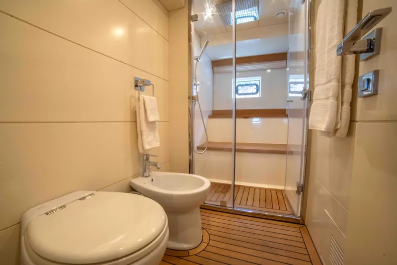 Sand Bar Yacht Photos Pics Luxurious bathroom in 2018 Sirena 64 yacht with shower, toilet, and bidet.