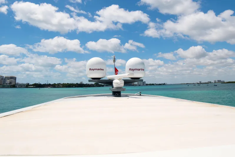 Sand Bar Yacht Photos Pics Bow view of 2018 Sirena 64 yacht with Raymarine radar domes on a sunny day.