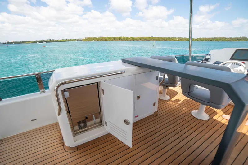 Sand Bar Yacht Photos Pics 2018 Sirena 64 yacht deck with open storage and ocean view.