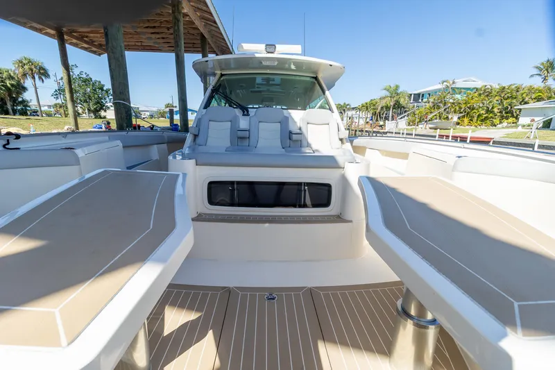  Yacht Photos Pics 2020 Scout 530LXF luxury boat interior with seating and deck view.