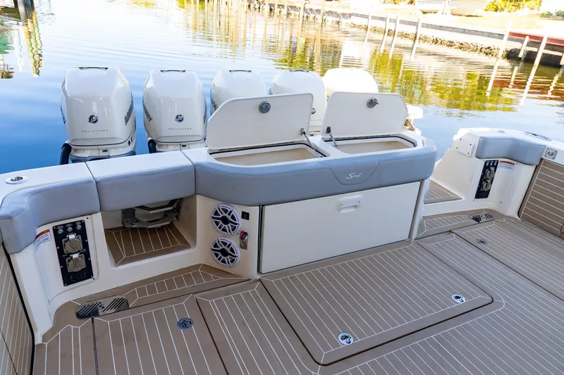  Yacht Photos Pics 2020 Scout 530LXF boat deck with quad engines and sleek design.