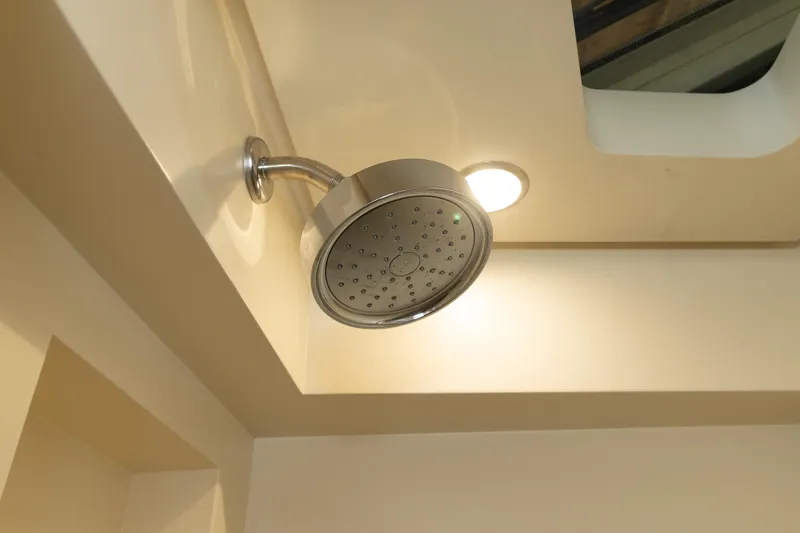  Yacht Photos Pics Showerhead in 2020 Scout 530LXF boat interior, featuring modern design and lighting.