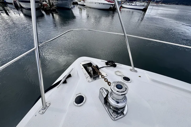 Family Affair IV Yacht Photos Pics Bow view of 1997 Carver 500 Cockpit Motor Yacht at marina.