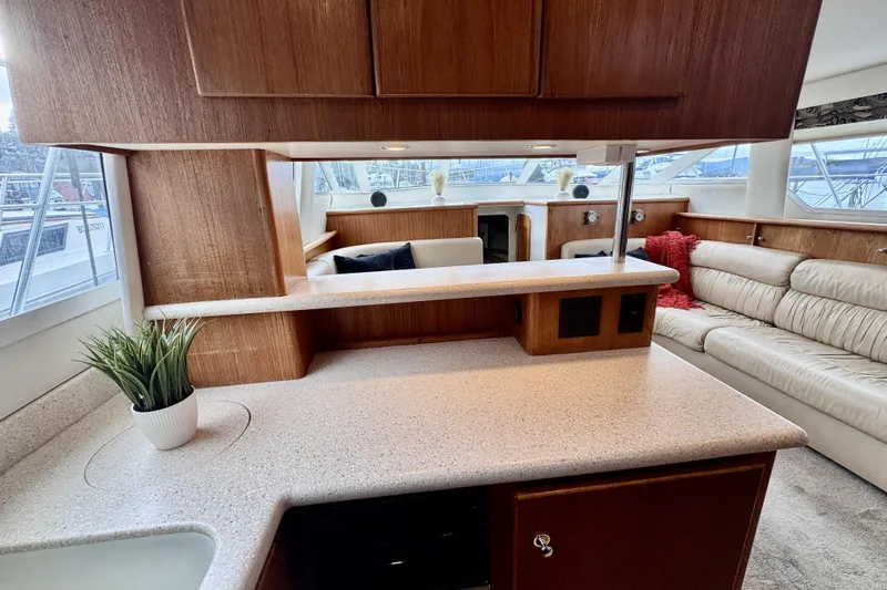 Family Affair IV Yacht Photos Pics Interior of 1997 Carver 500 Cockpit Motor Yacht with modern furnishings and natural light.