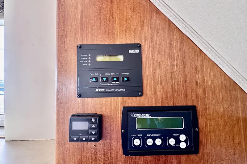 Family Affair IV Yacht Photos Pics Control panels on 1997 Carver 500 Cockpit Motor Yacht interior.