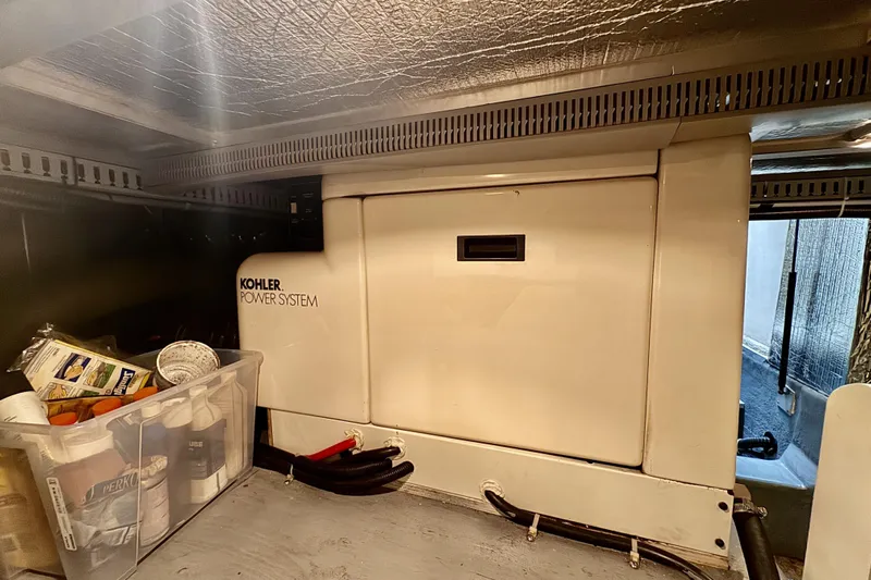 Family Affair IV Yacht Photos Pics Kohler power system in 1997 Carver 500 Cockpit Motor Yacht engine room.