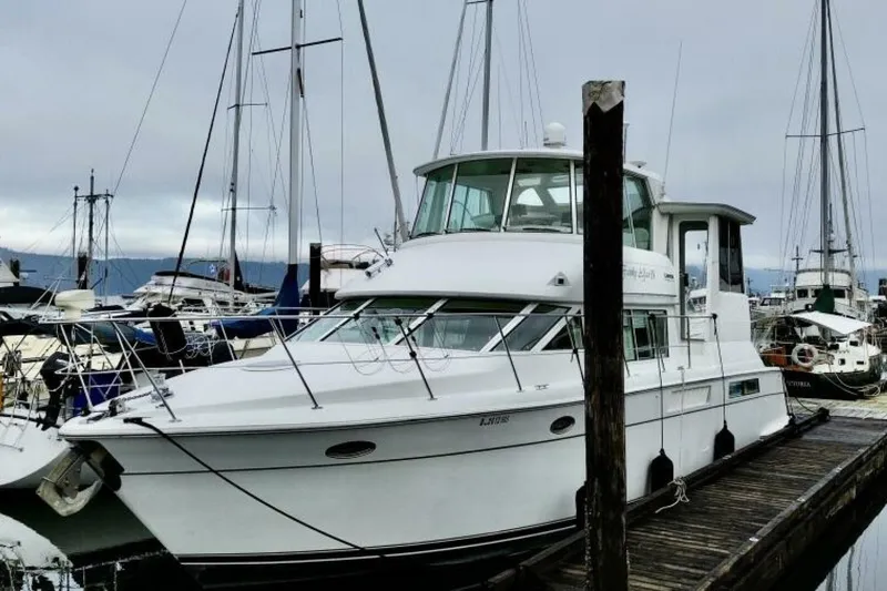 Family Affair IV Yacht Photos Pics 1997 Carver 500 Cockpit Motor Yacht docked at marina.