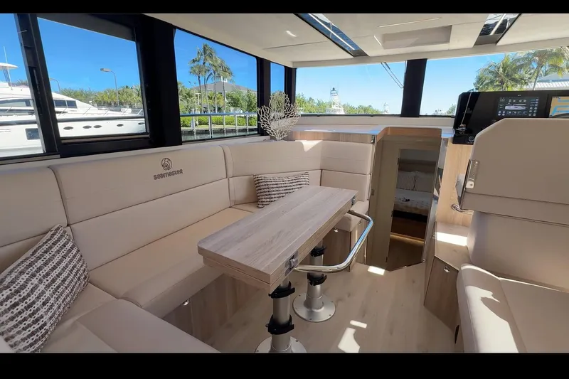  Yacht Photos Pics Luxurious interior of 2026 Cobra Yachts Seamaster 45 with modern seating and table.