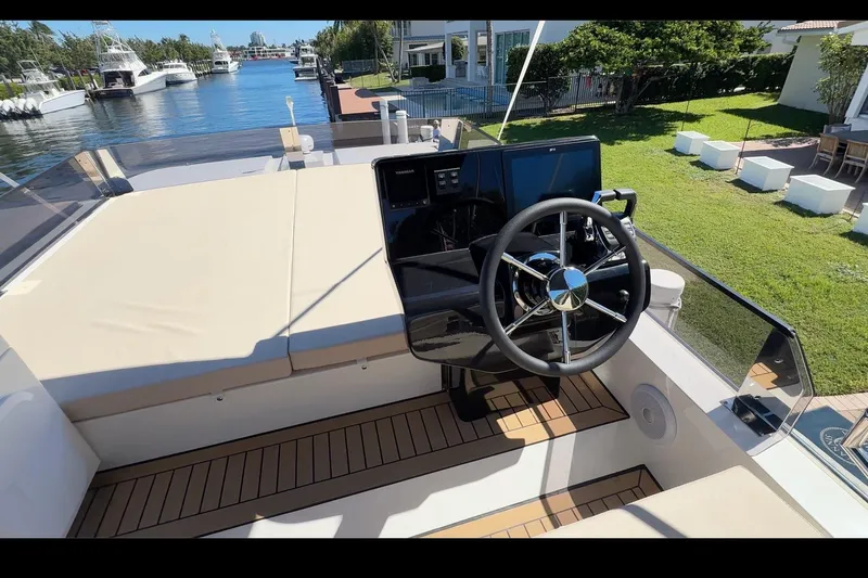  Yacht Photos Pics Steering area of 2026 Cobra Yachts Seamaster 45, featuring modern controls and spacious deck.