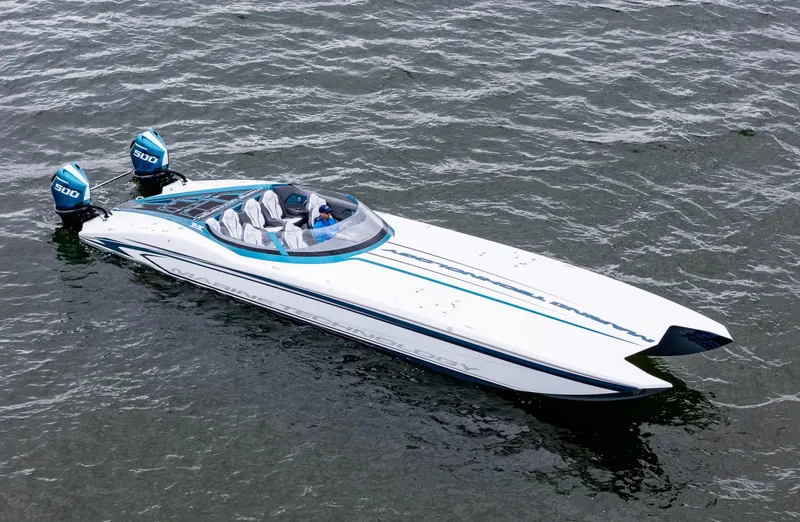  Yacht Photos Pics 2026 MTI 440X speedboat with dual engines on water.