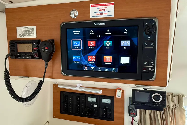 Wander Cat Yacht Photos Pics Control panel of a 2004 Lagoon 380 catamaran with navigation and communication equipment.