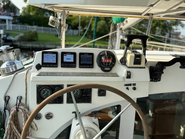 Wander Cat Yacht Photos Pics Steering console of a 2004 Lagoon 380 catamaran with navigation instruments.