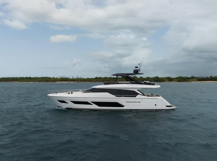 Calma Yacht Photos Pics 2023 Ferretti Yachts 720 cruising on open water under cloudy skies.