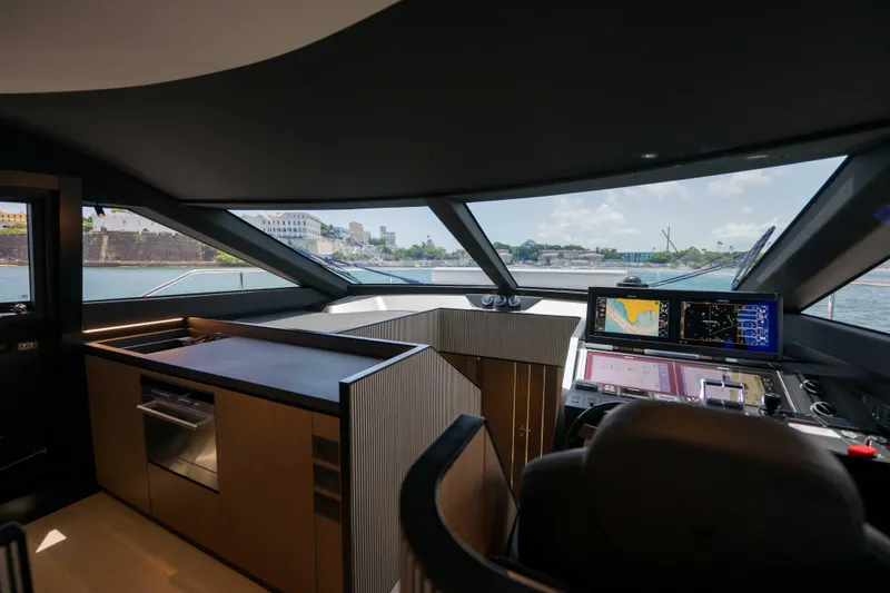 Calma Yacht Photos Pics Interior of 2023 Ferretti Yachts 720, featuring modern helm and navigation systems.