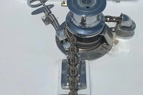 Audacity Yacht Photos Pics Anchor windlass on 1990 Broward Raised Pilothouse MY yacht deck.
