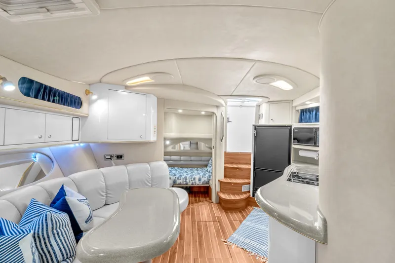  Yacht Photos Pics Luxurious interior of 1997 Sea Ray 400 Sundancer yacht with modern amenities and elegant design.