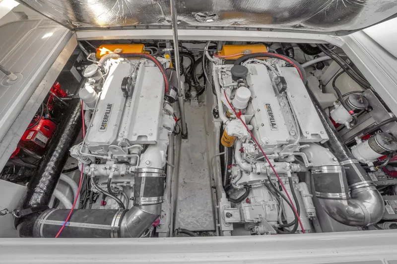  Yacht Photos Pics Engine room of 1997 Sea Ray 400 Sundancer with twin Caterpillar engines.